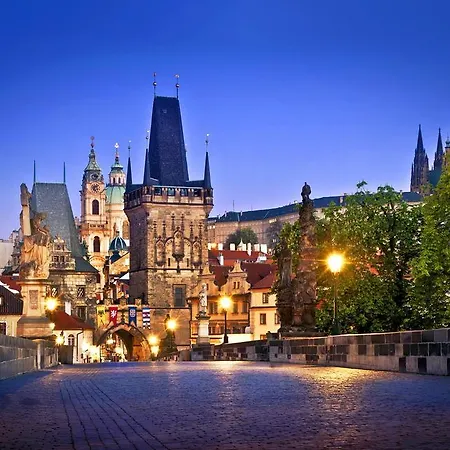 Royal By Charles Bridge View Of Saint Nicholas Church