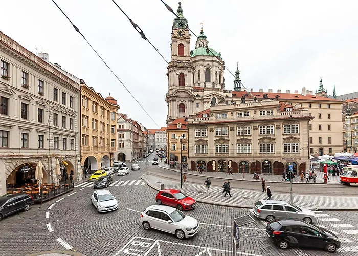 Royal By Charles Bridge View Of Saint Nicholas Church